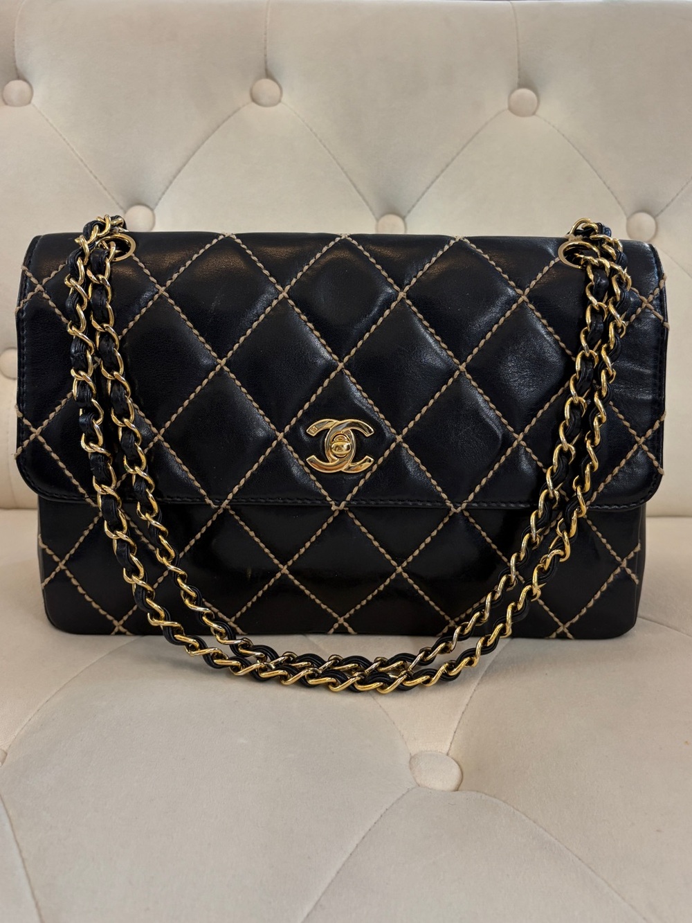 CHANEL Black Quilted Shoulder Bag with Gold Accents